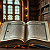Post: These images, six in number, all depict open books in candlelit libraries of antique splendor—tall...